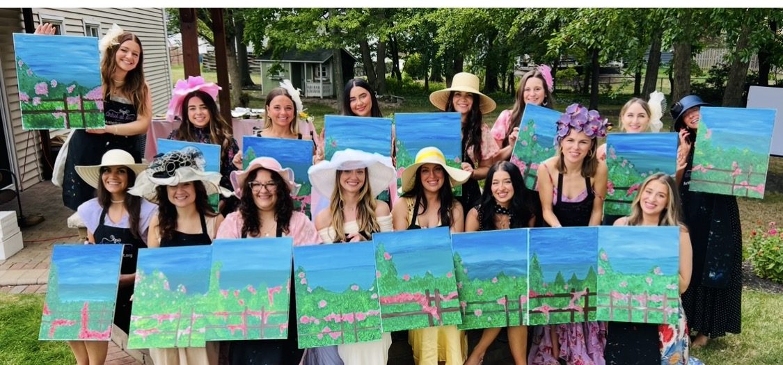 Guests at an Artist at Heart paint and sip party in Cleveland