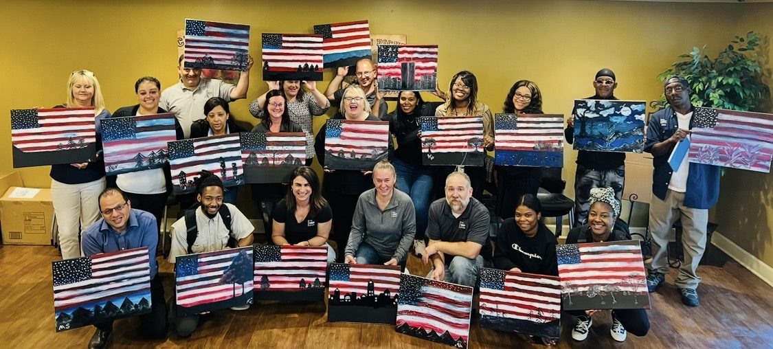 Guests at an Artist at Heart paint and sip party in Cleveland