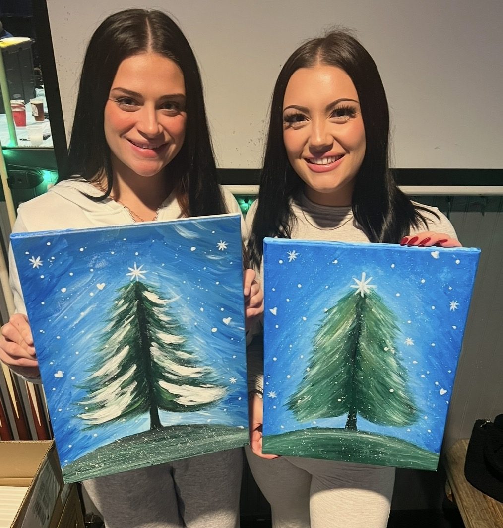 Guests at an Artist at Heart paint and sip party in Cleveland