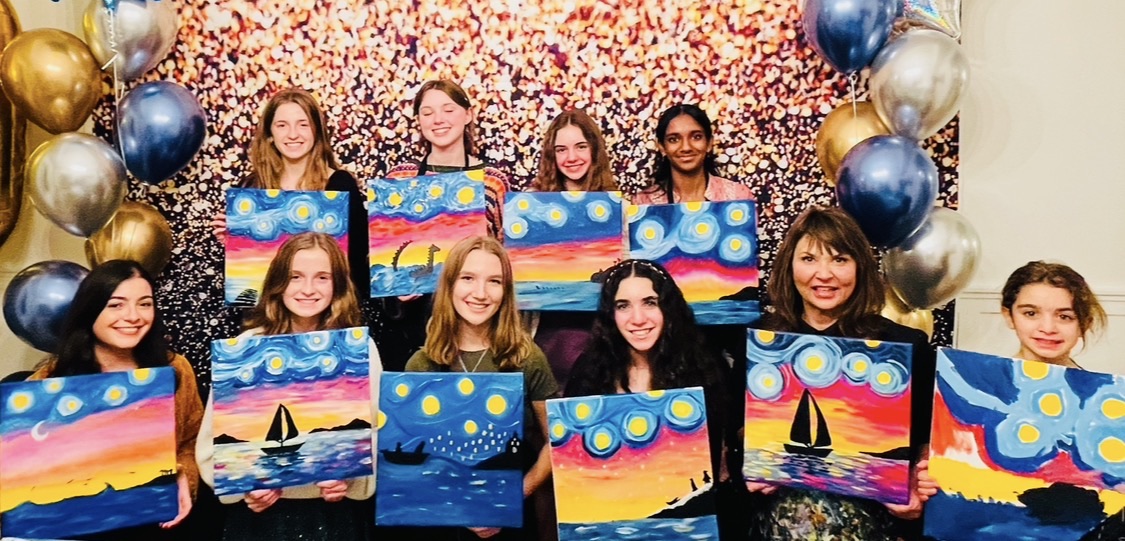 Child canvas painting at a kids paint and sip party in Cleveland
