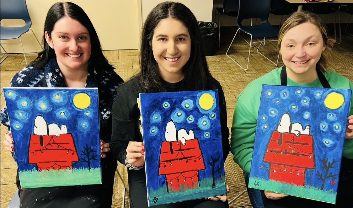Guests at an Artist at Heart paint and sip party in Cleveland