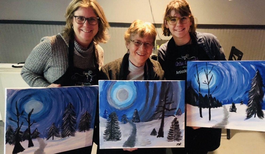 Guests at an Artist at Heart paint and sip party in Cleveland