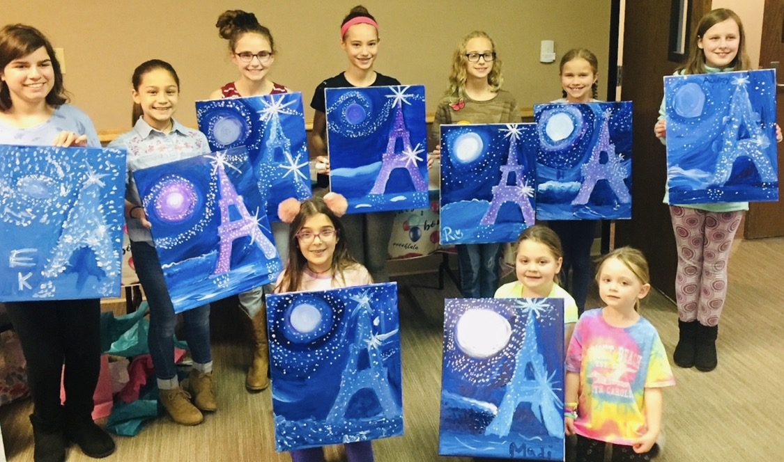 Guests at an Artist at Heart paint and sip party in Cleveland