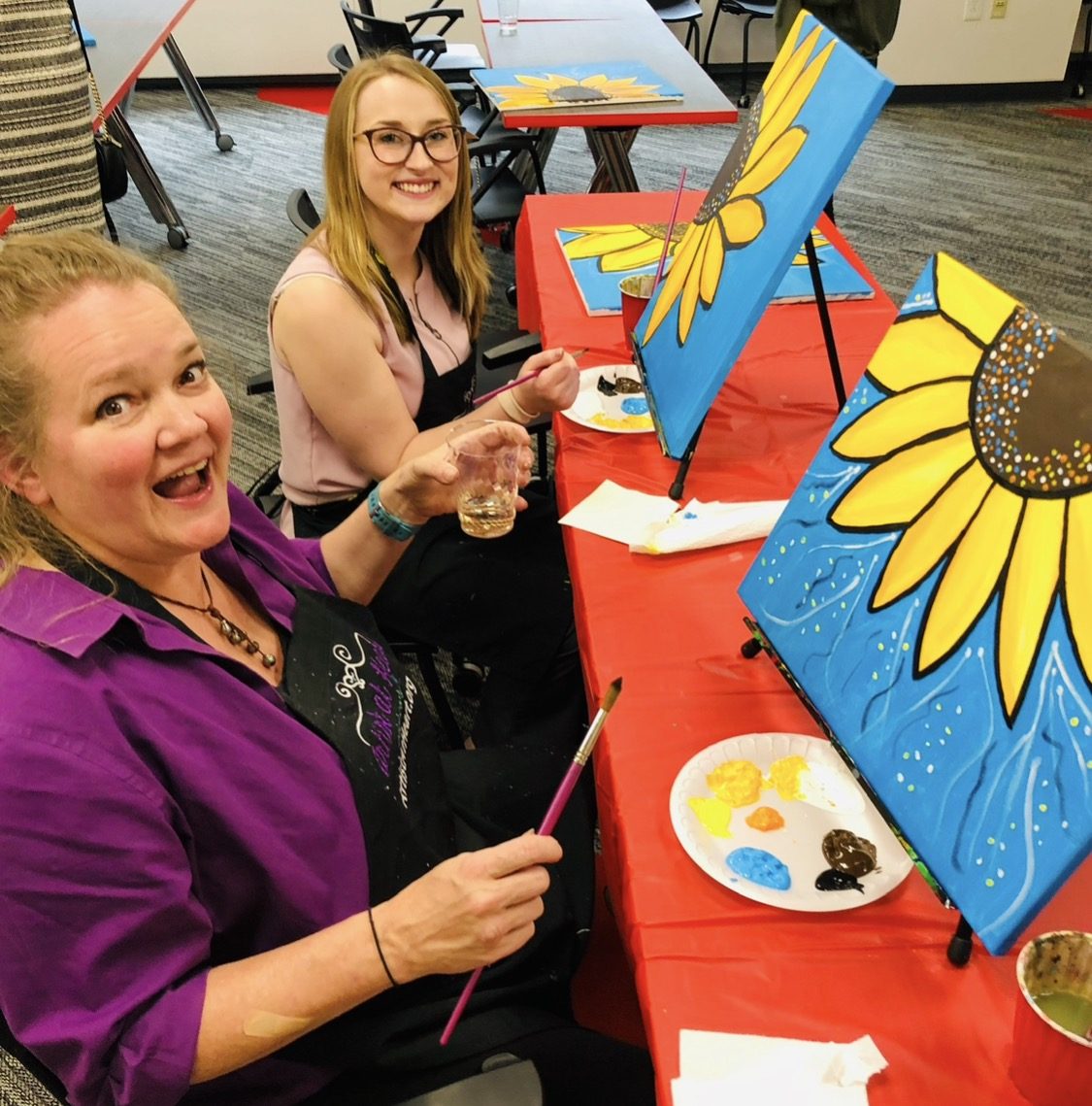Guests at an Artist at Heart paint and sip party in Cleveland