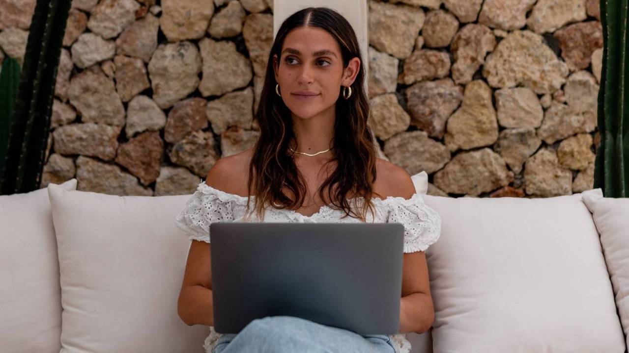 woman with laptop brainstorming