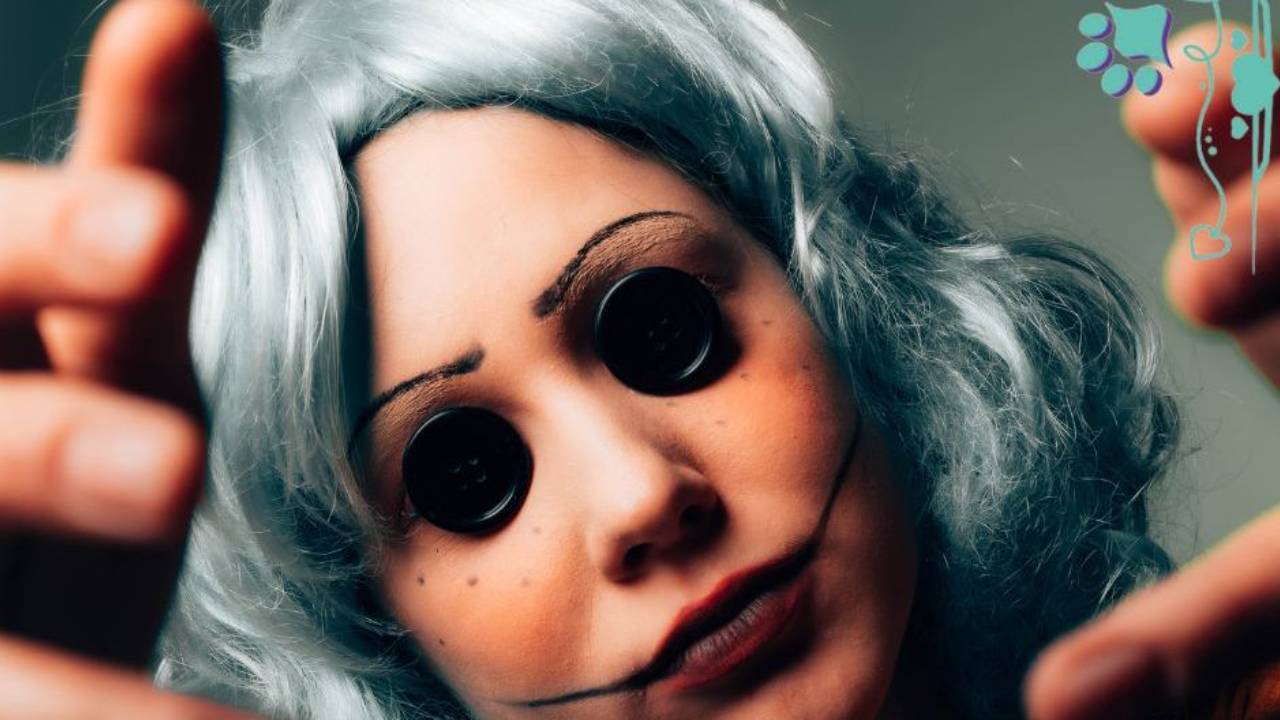 A person wearing a grey wig, scary make up, and making threatening gestures with their hands, Sandy Weaver, dog training, Halloween, scary movies, conformation dog training, conformation seminars, conformation dog training, online seminars, in person seminars, dog shows
