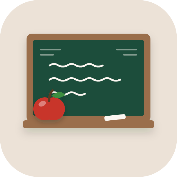 A classroom chalkboard with an apple on the chalk tray