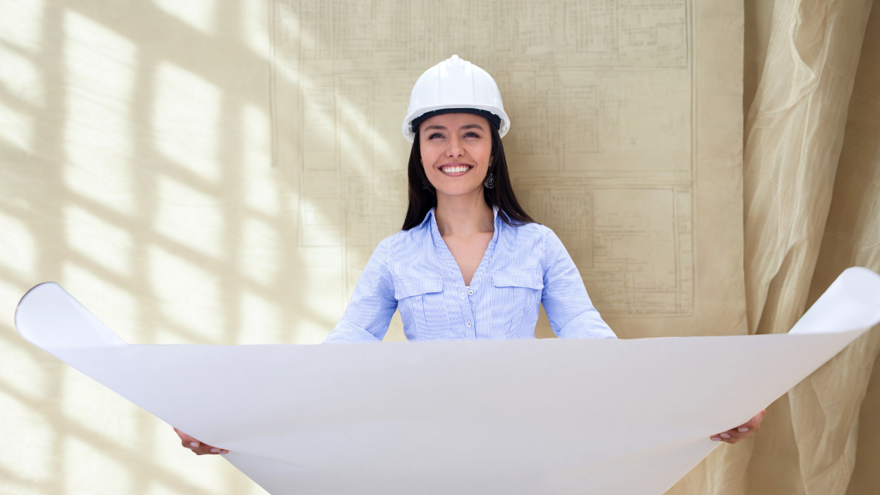 Woman smiling at her blueprint of life