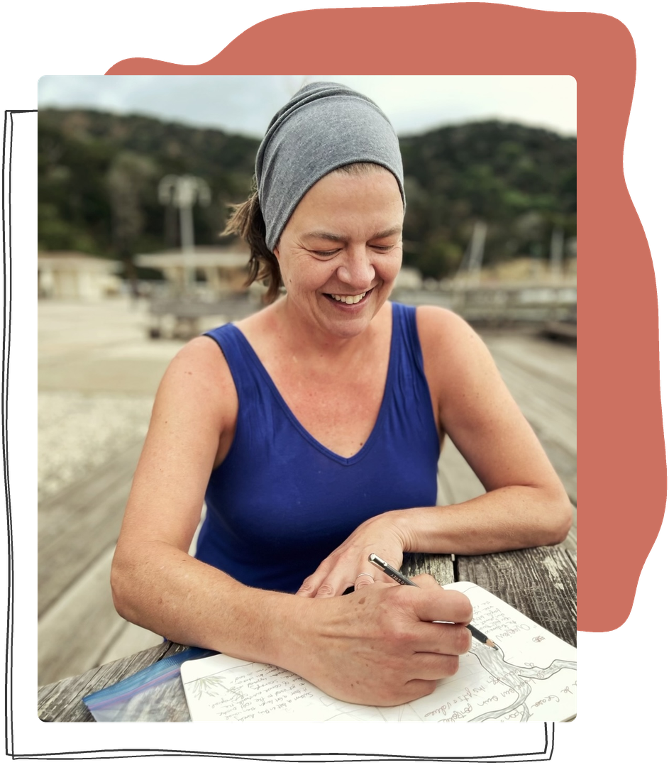 JoAnne T., Everyday Self-Compassion student, art journaling at an outdoor table