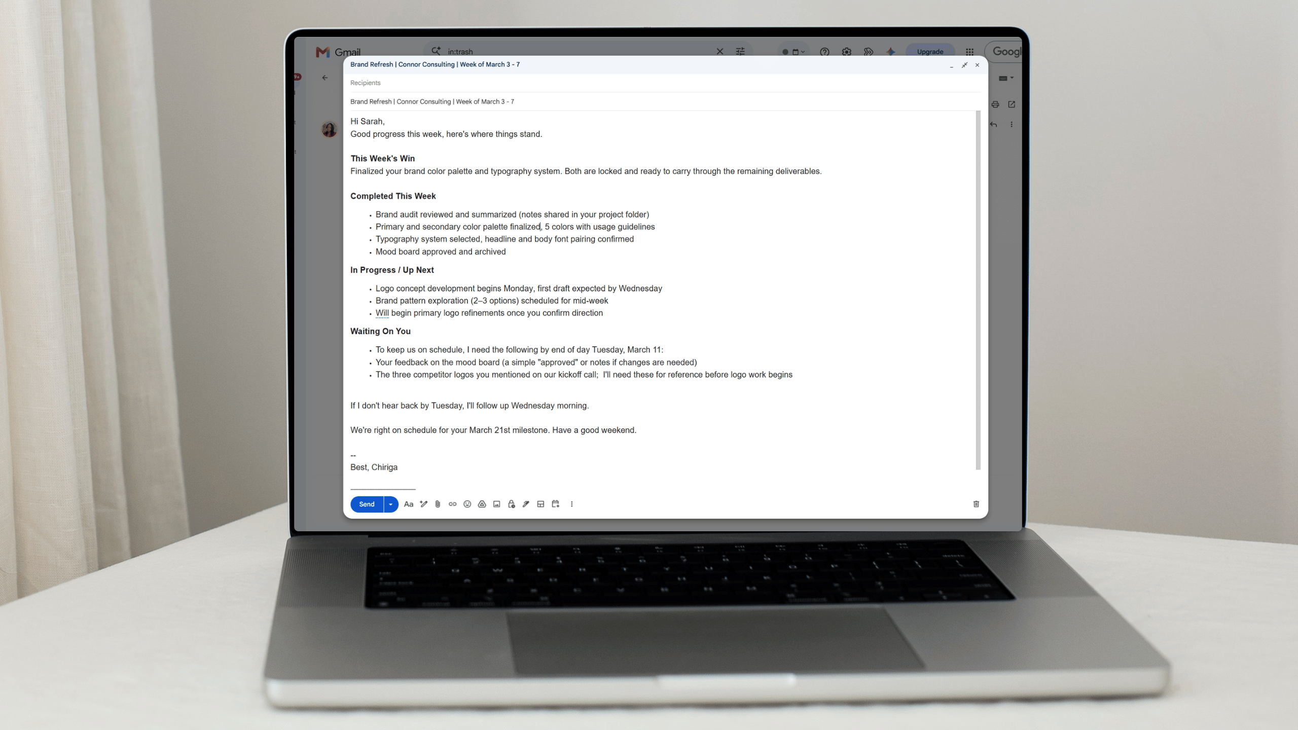 An example of a clean weekly client update on a laptop