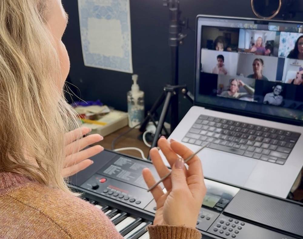 Whitney leading a live session
