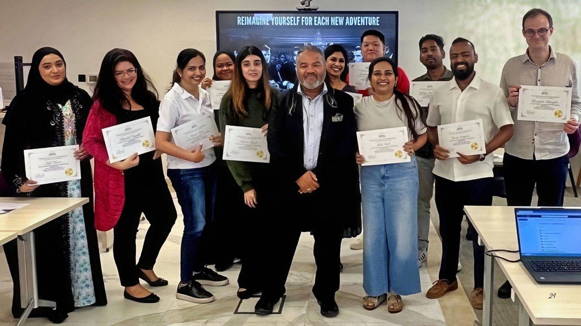 Dave Crane with participants after delivering a professional training and development session in Dubai.