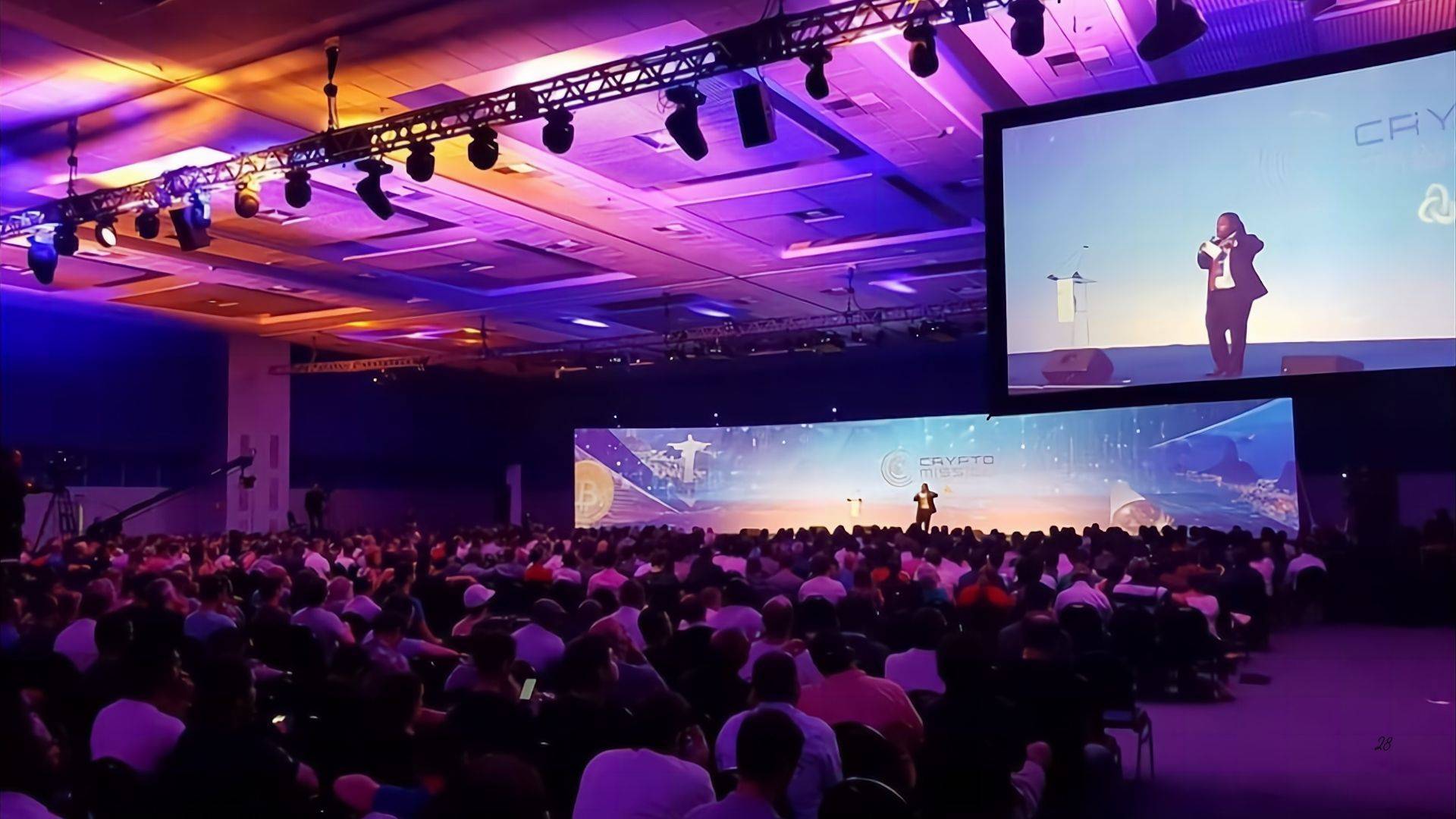 Dave Crane delivering a keynote presentation to a large international conference audience in Rio..