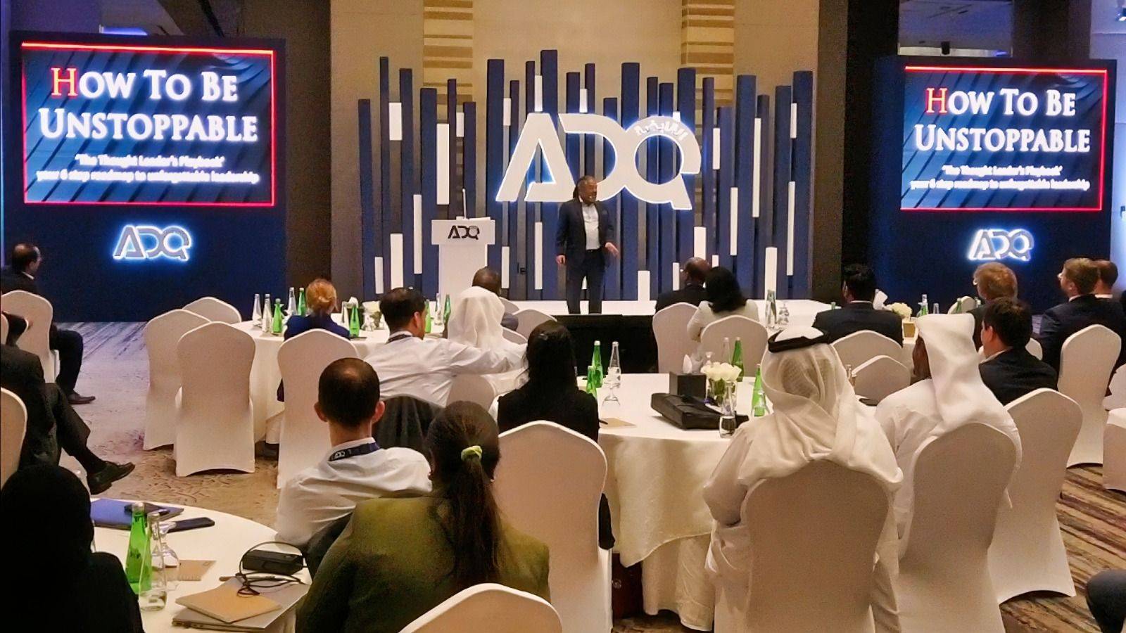 Dave Crane presenting the How to Be Unstoppable keynote at a corporate leadership event.