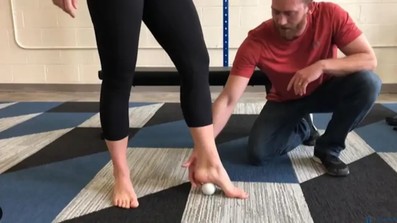 Patient receiving a lower leg assessment from a physical therapist at a running physical therapy clinic in Columbus, OH