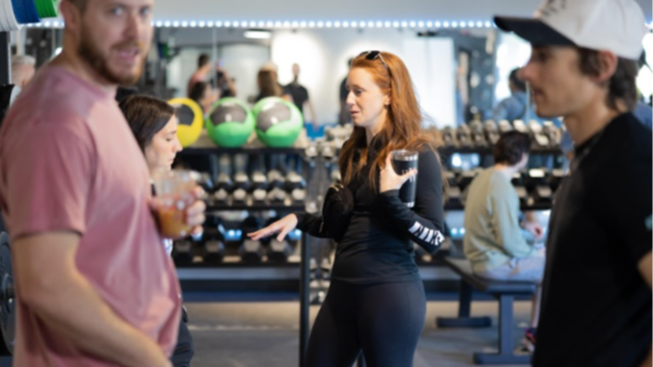 physical therapist working one-on-one with an active patient during a full-session evaluation