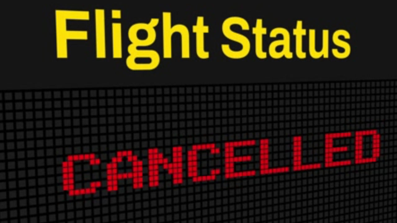 Sign indicating that a scheduled flight has been cancelled 