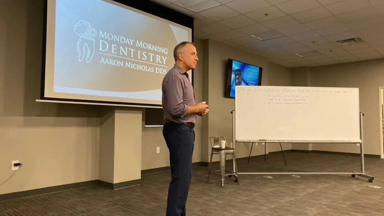 Dr. Aaron Nicholas presenting dental efficiency strategies during a Monday Morning Dentistry lecture