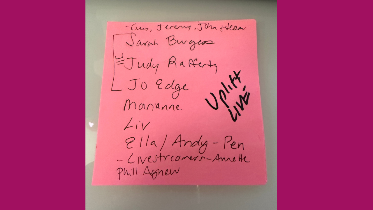 Pink post-it note with handwritten UpLift Live shoutout list including Gus, Jeremy, John and team, Sarah Burgess, Judy Rafferty, Jo Edge, Marianne, Liv, Ella/Andy, Livestreamers-Annette, and Phill Agnew