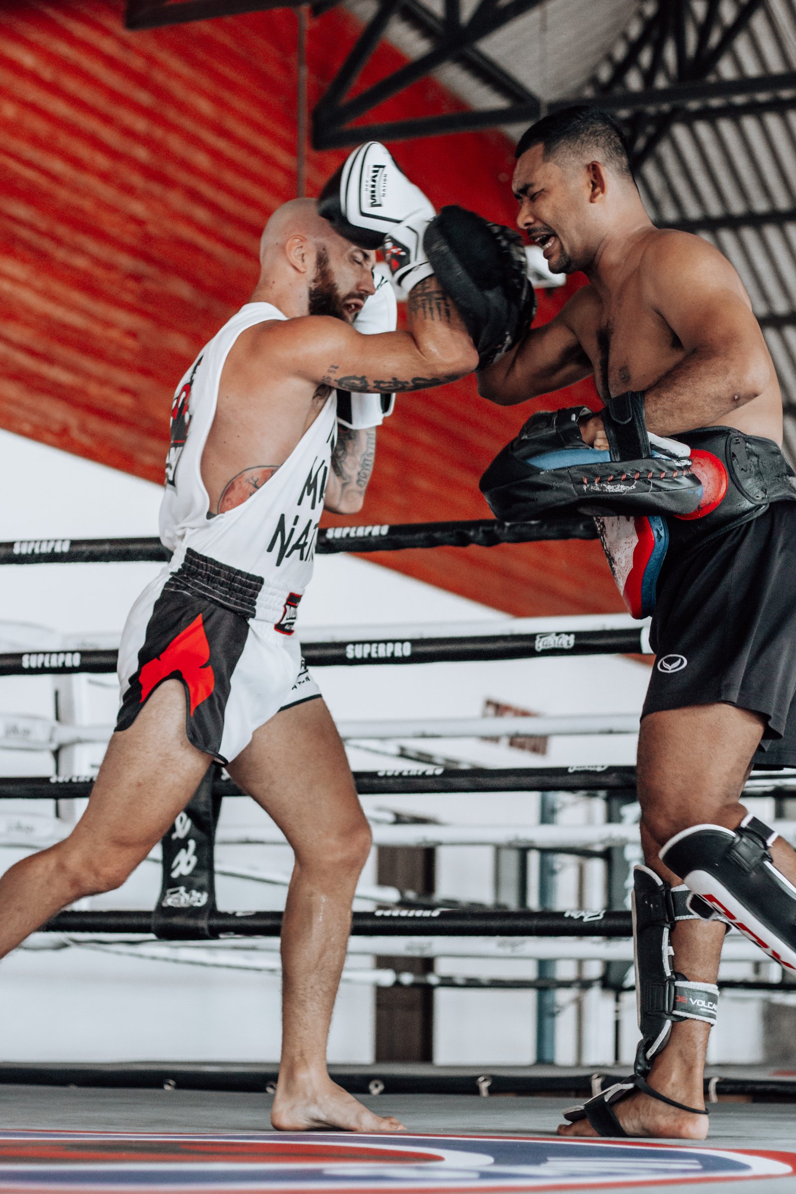 Sean throwing a punch on the pads