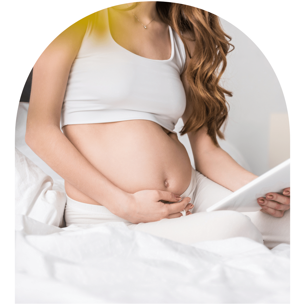 Partial view of long-haired pregnant woman