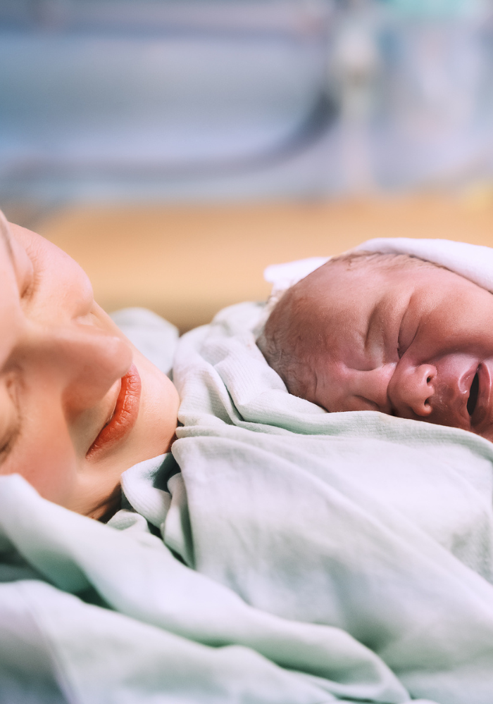 Mother and newborn. Child birth in maternity hospital - Hypnobubs Positive Cesarean Birth Online Course