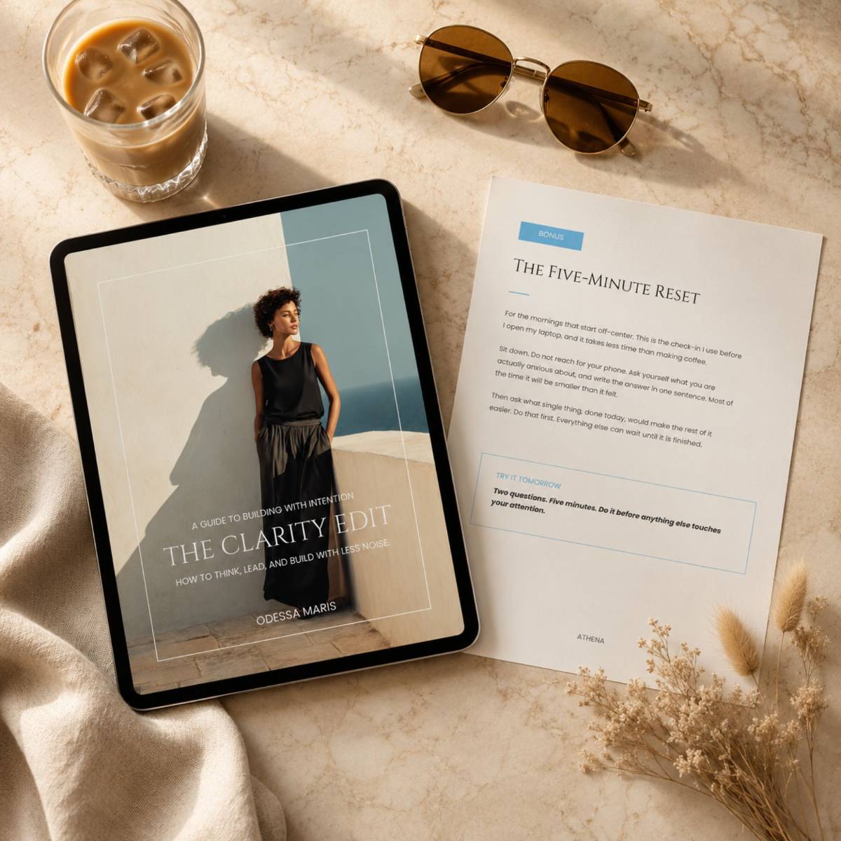 Ebook template shown on a tablet beside iced coffee, sunglasses, and a bonus reflection page on a marble surface.