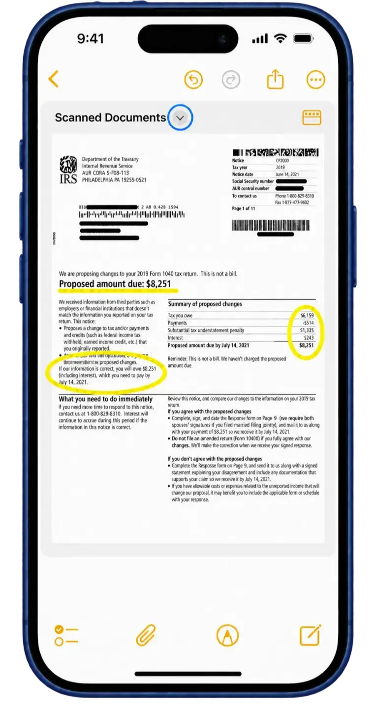 The scanned PDF in Notes with the small arrow beside Scanned Documents highlighted.