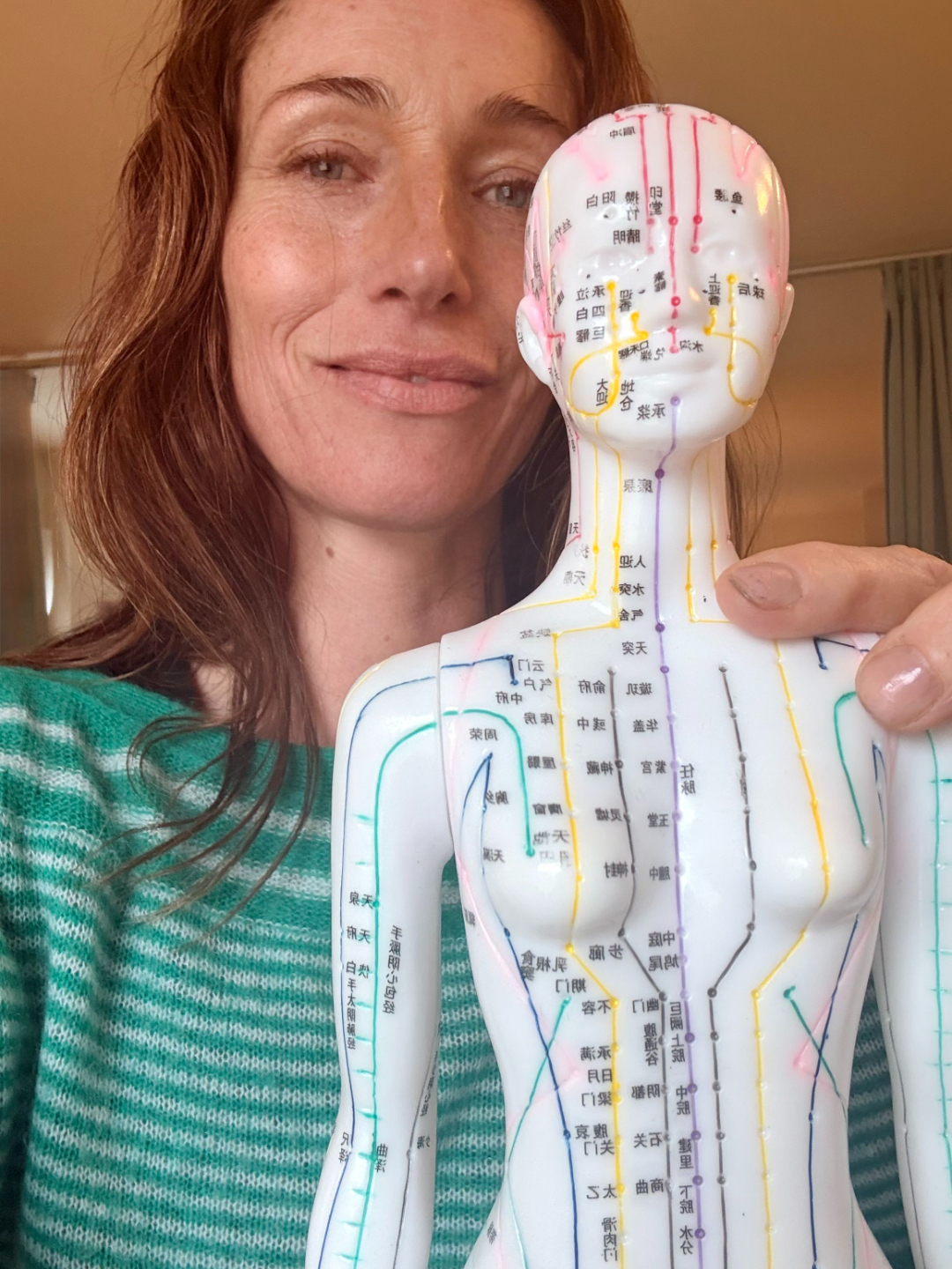 Angela Chambers Acupressure with gua sha stone