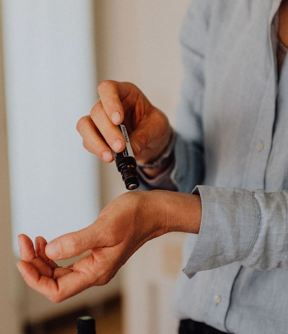 Angela Chambers with essential oil on pulse