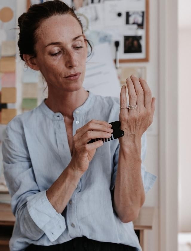 Angela Chambers Acupressure with gua sha stone