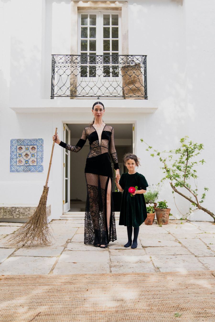 Georgiana and her daughter Rise holding hands