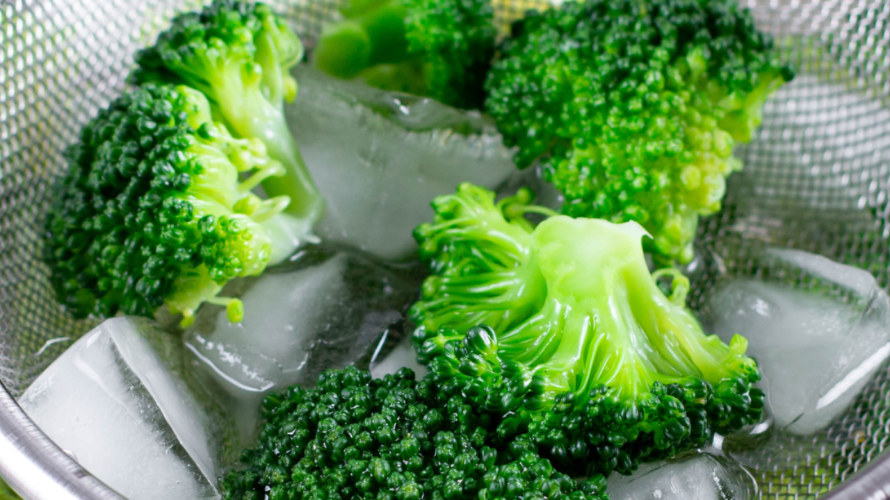 broccoli cooling in an ice bath after blanching