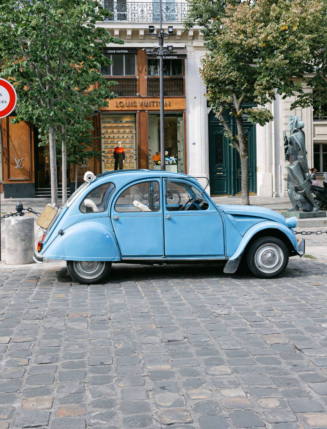 A classic Citroën 2CV on the streets of Paris
