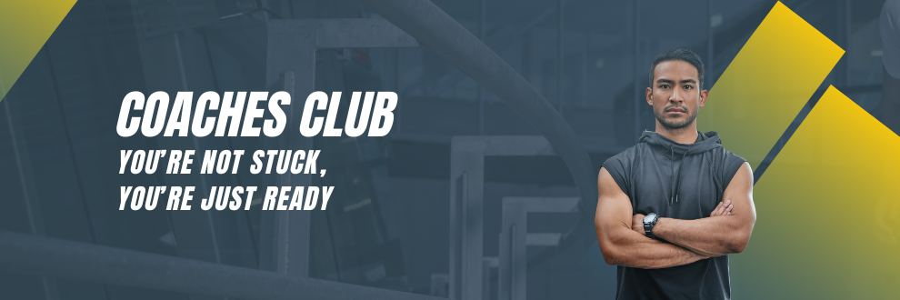 Banner image for Coaches Club membership featuring a confident male fitness coach with arms crossed against a gym background with the tagline "You're not stuck, you're just ready."
