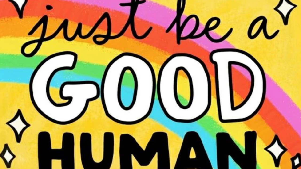 Colorful illustrated graphic with a bright yellow background and a rainbow arc. Bold hand-lettered text reads "just be a GOOD HUMAN" in a mix of black script, white bubble letters, and black block letters, with small sparkle accents throughout.