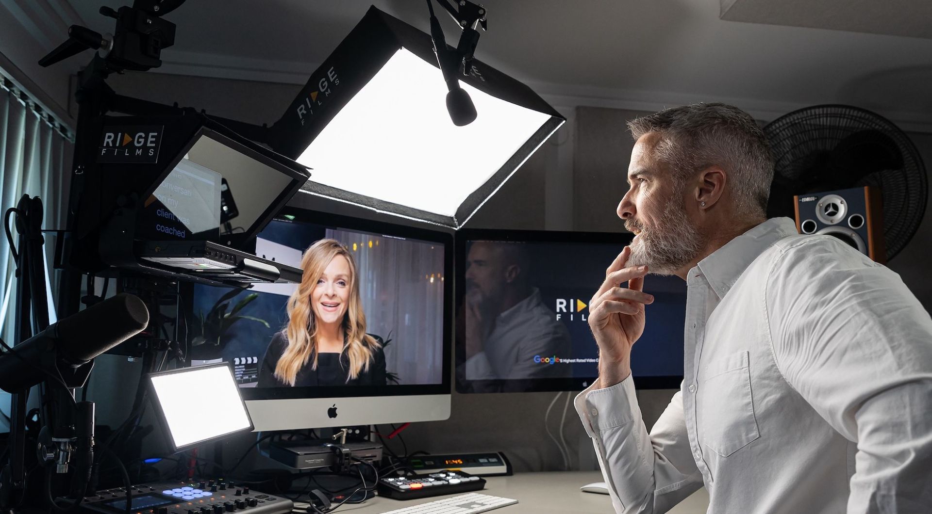 Chris Schwager at the Desktop Studio, recording with a guest on screen