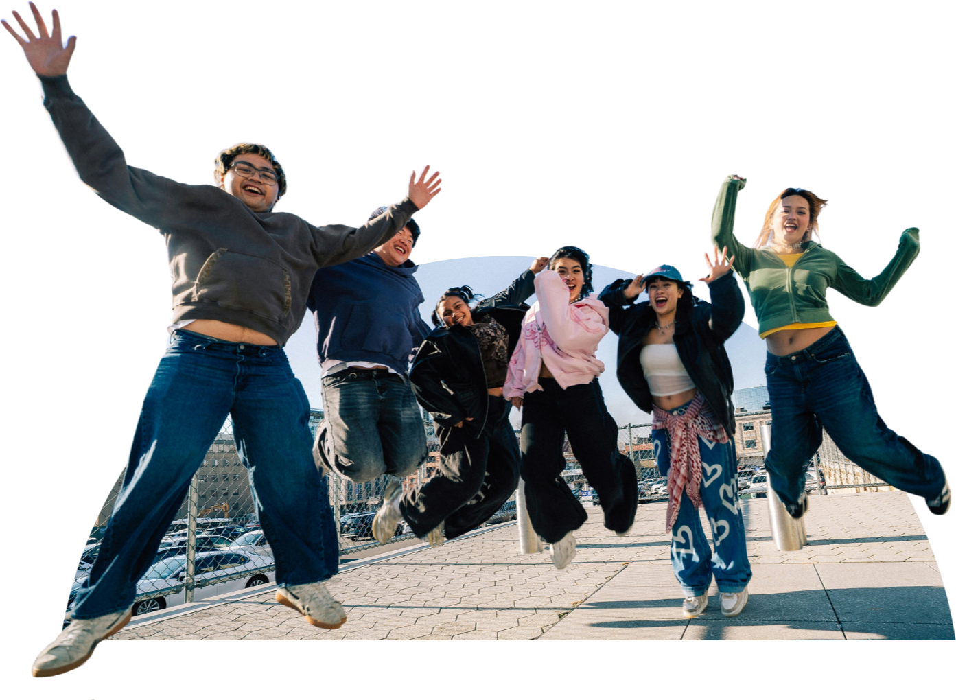 excited group of students jumping in unison after the fun of Chroma Drop