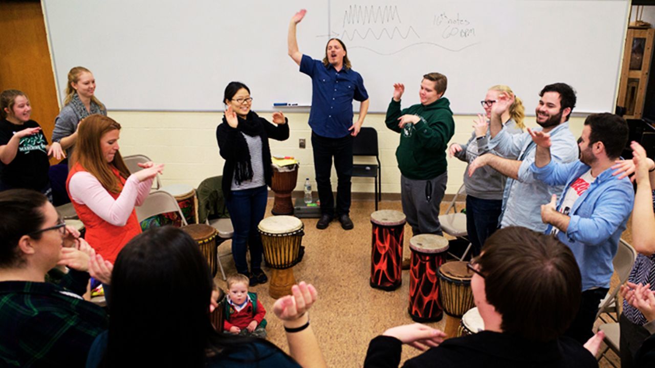 Jim Donovan leading a drum circle, music and mindfulness program