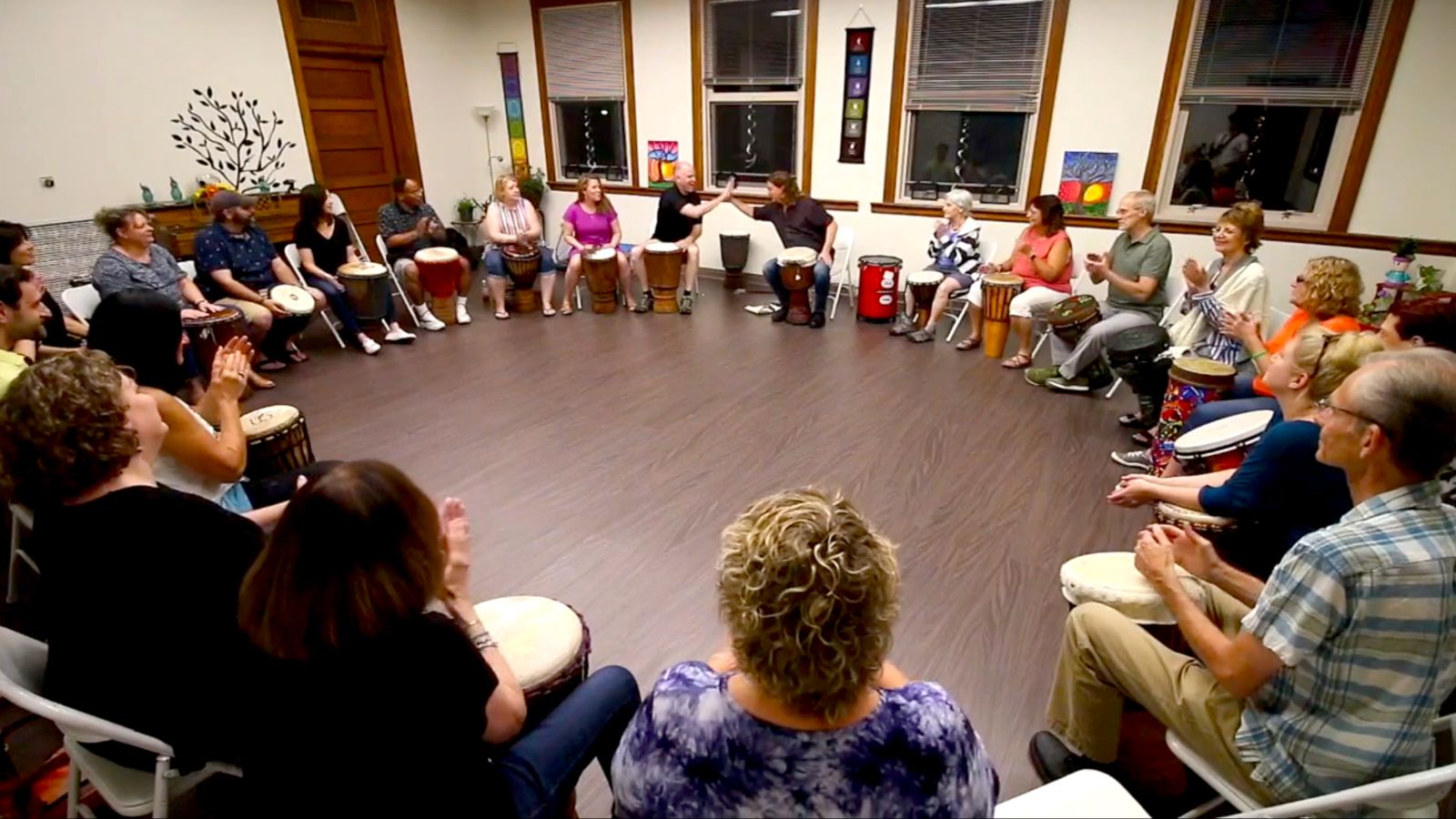 Jim Donovan leading a therapeutic drum circle training session