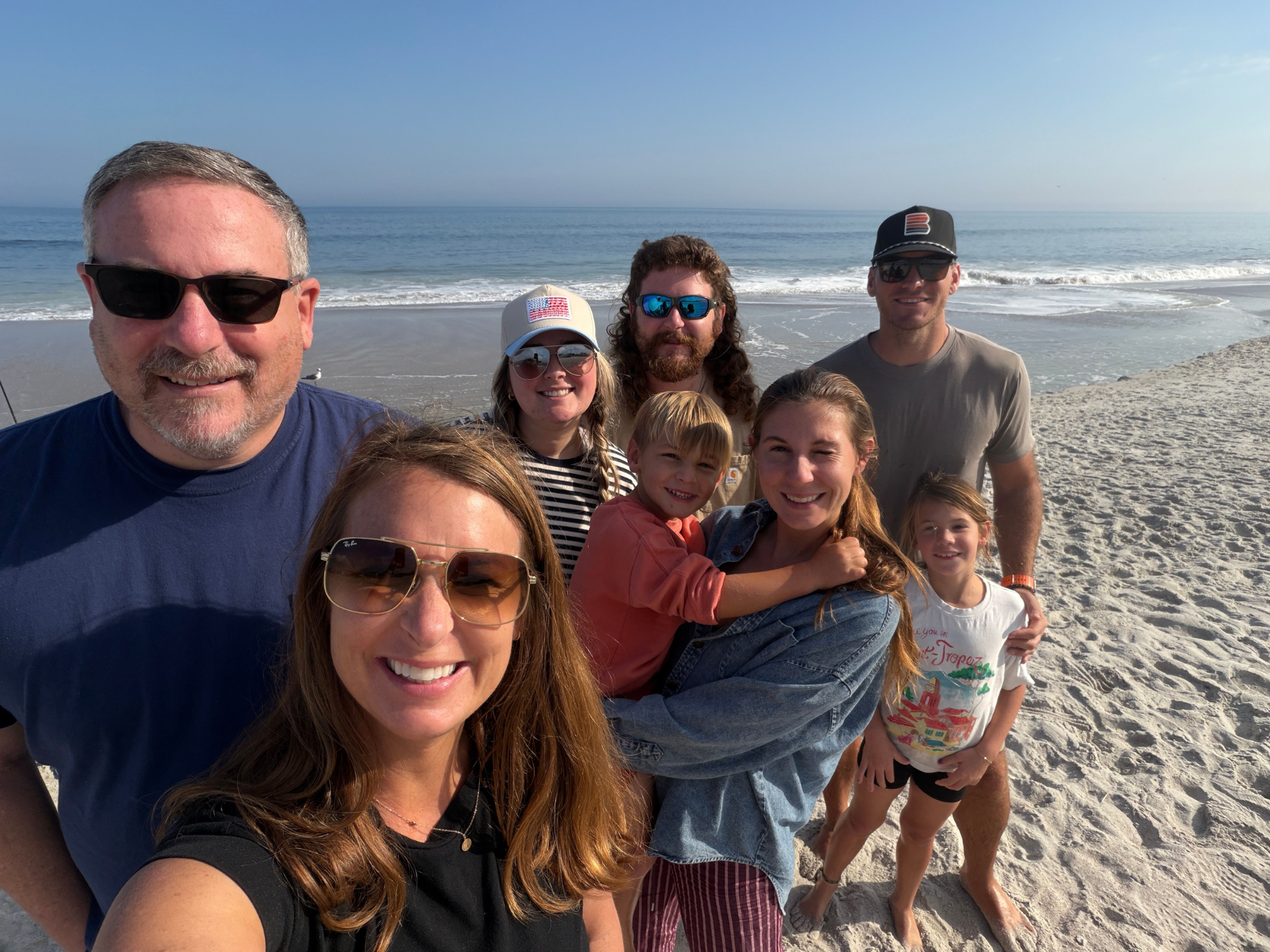 scott and melissa in front of an amelia island sunset
