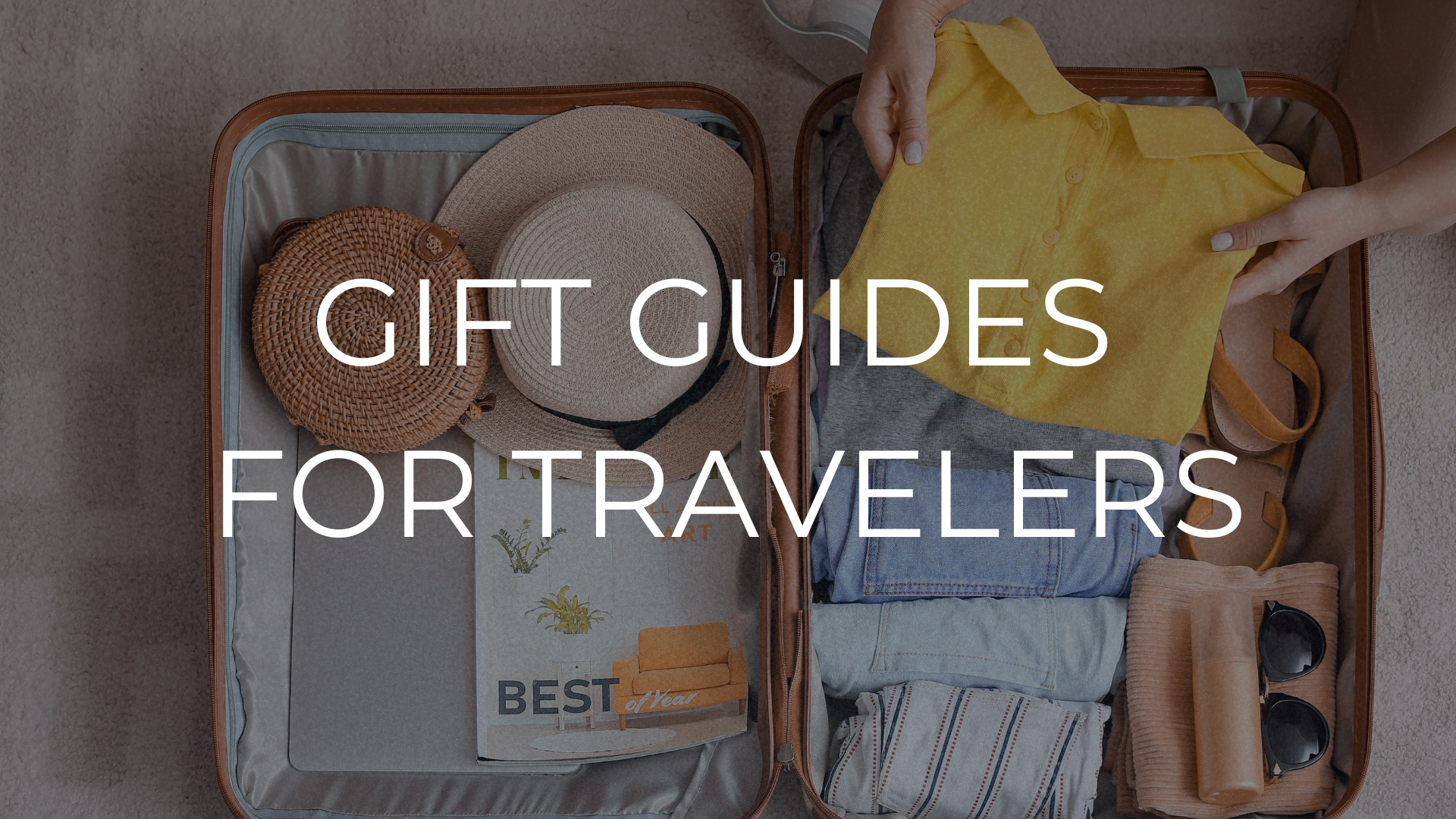packing a suitcase with title gift guides for travelers