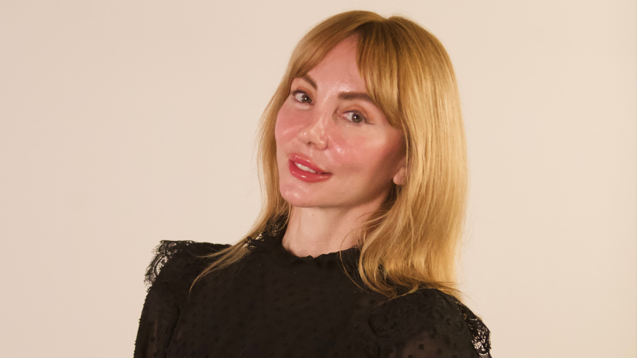 Olga Roberts, Body Intelligence Pilates founder and women’s wellness leader, in a professional headshot