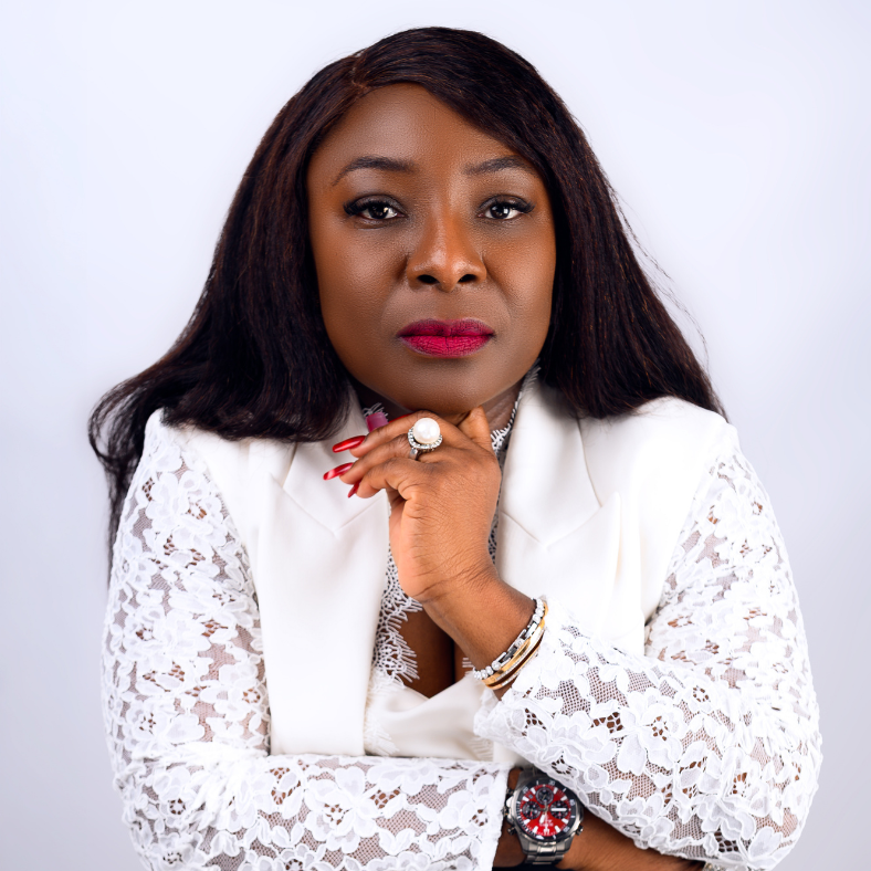 Bukie Adebola-Ezeh, speaker and coach helping women build identity-led businesses, in a professional portrait
