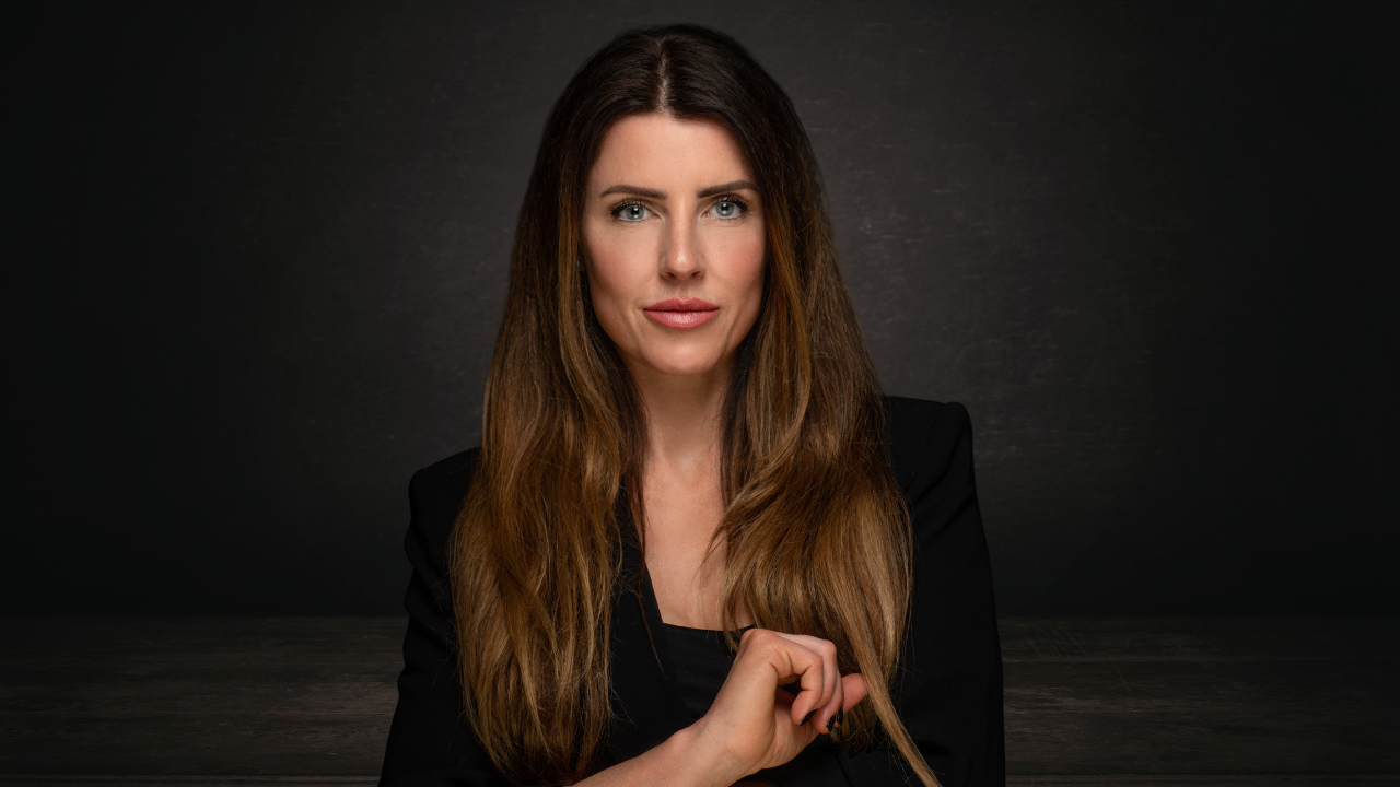 Gem Dentith, author of Undressed, in a professional portrait, representing leadership and self-awareness