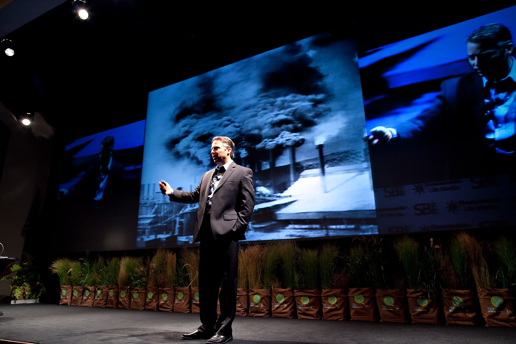 Dr. Gregory Unruh speaking on stage