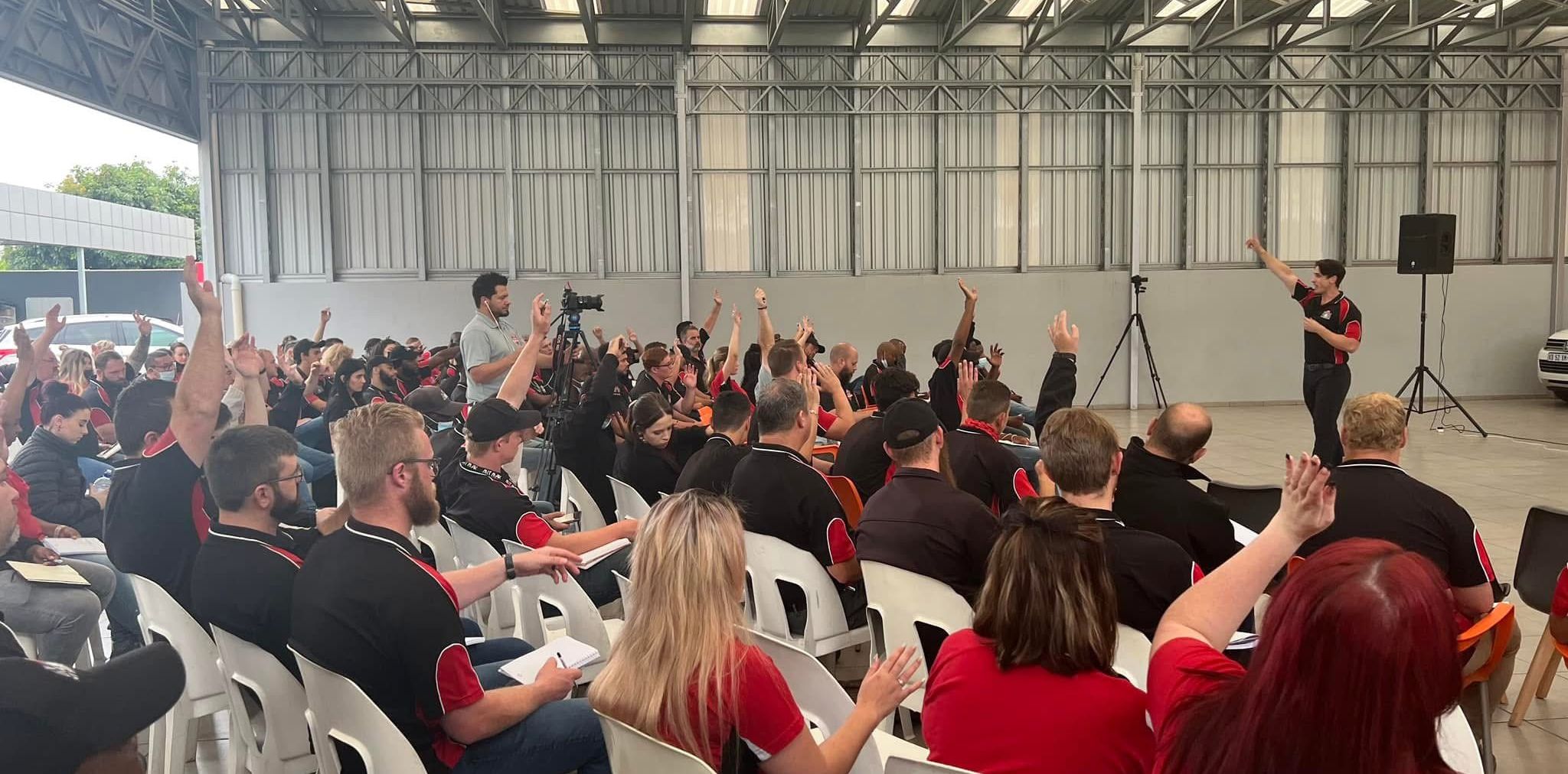Jacque Visagie speaking to an audience