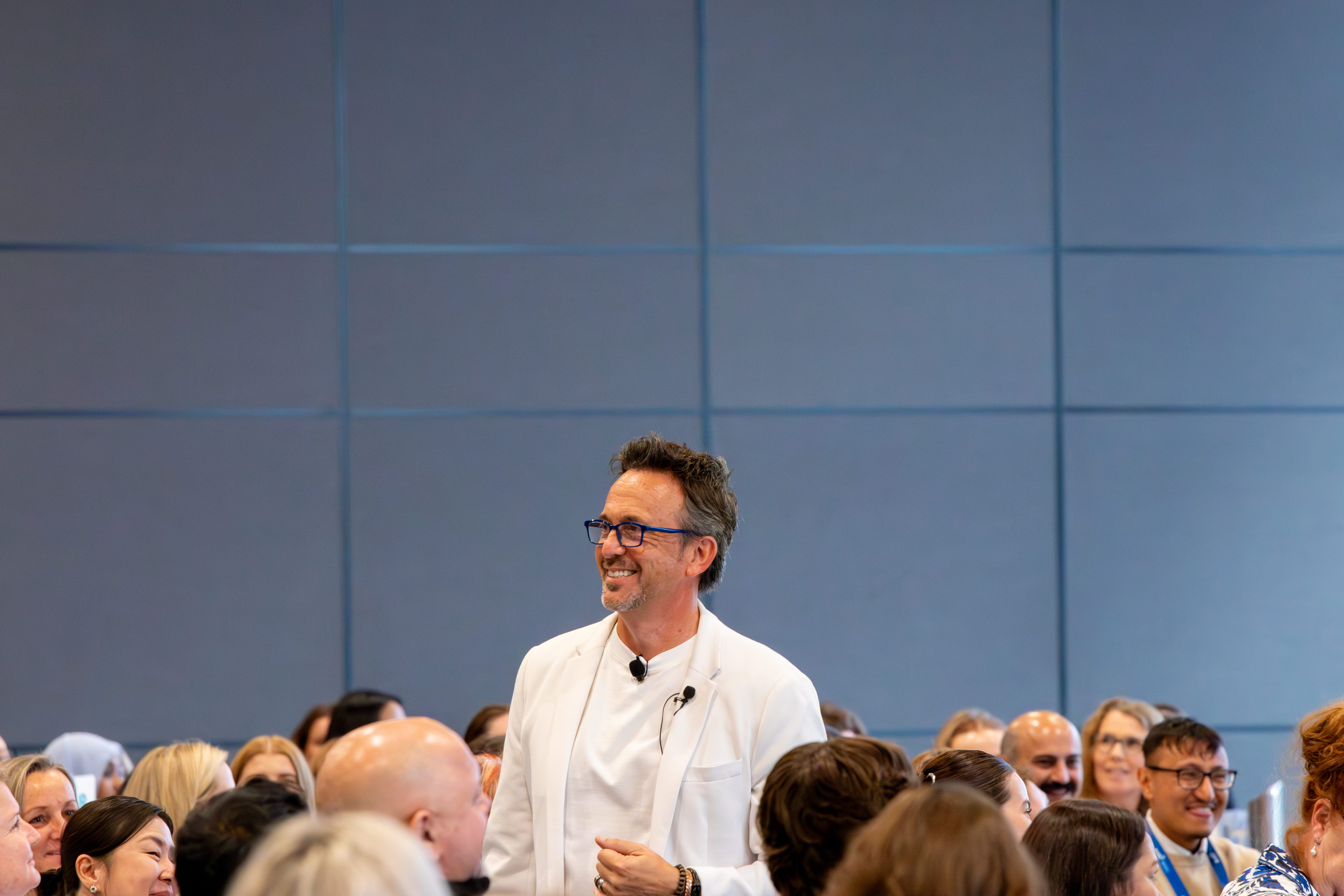 Dave Clare smiling and connecting with conference delegates