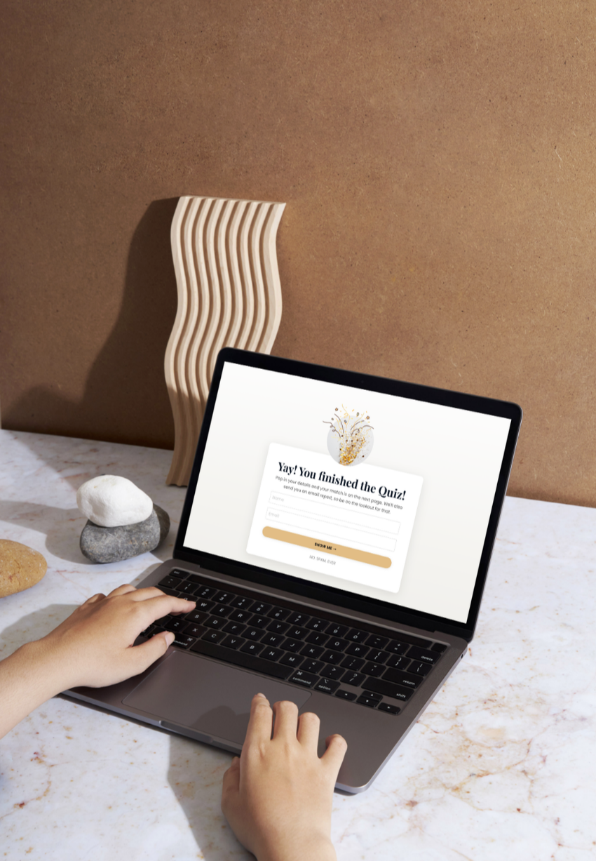 Laptop and tablet mockup of Pop Quiz — the quiz builder on one screen and a finished Kajabi quiz page on the other