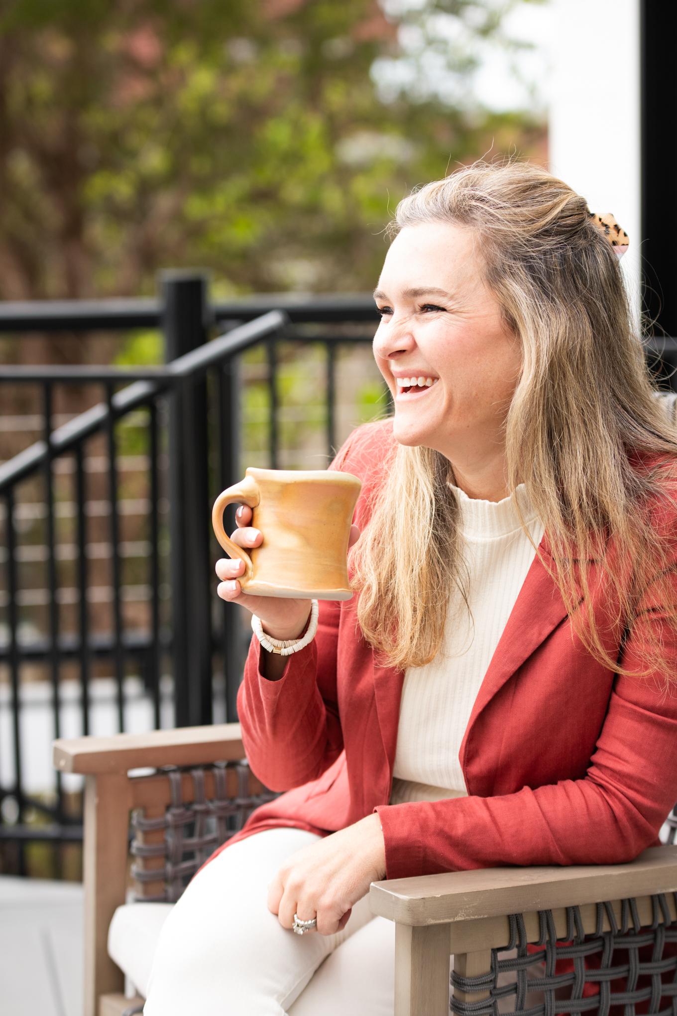 Dr. Jaclyn Smeaton, naturopathic physician, smiling with a mug of tea